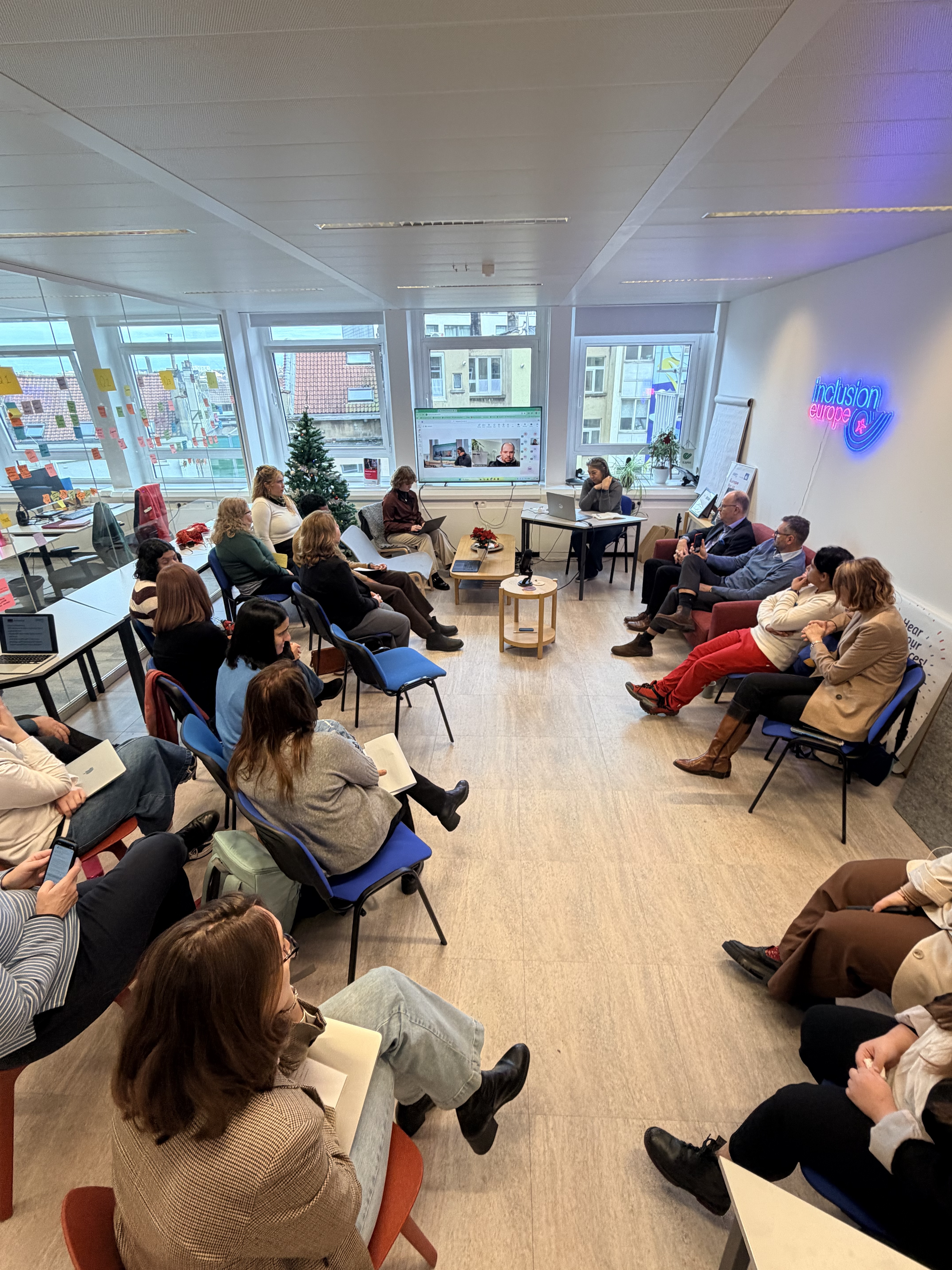 Self-advocates and their supporters attending final Hear Our Voices! event in Inclusion Europe's office and online