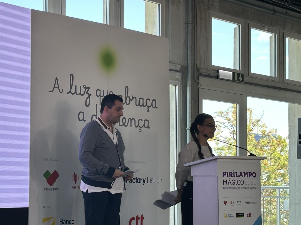 Albino Silva and Ana Carolinha Cunha speaking at the event