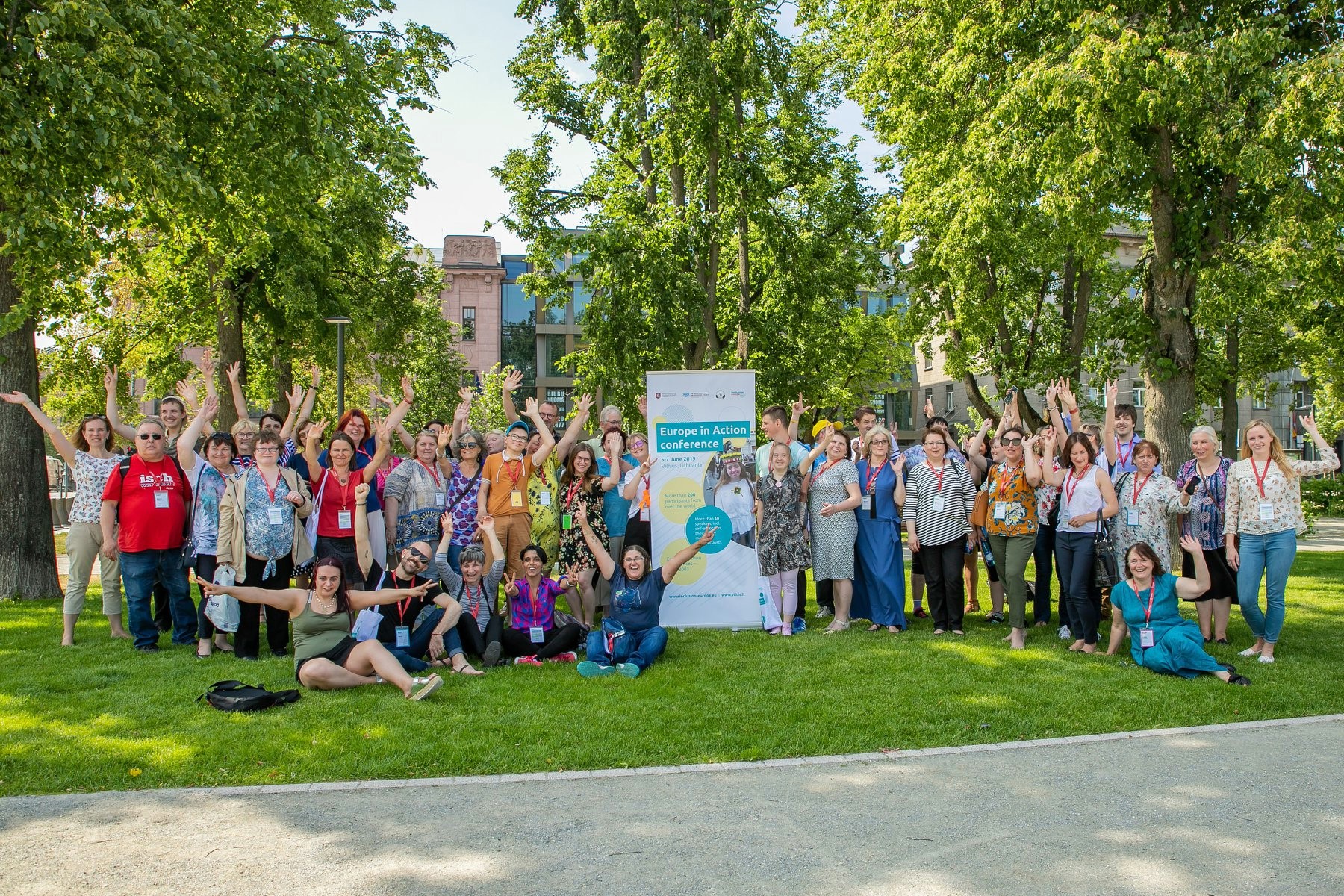 Group photo of conference participants during the event in public square