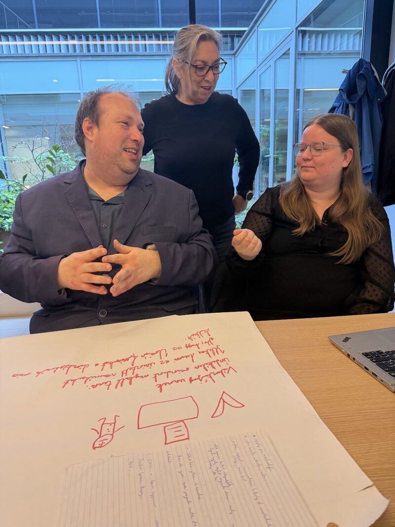 Participants working on their presentation